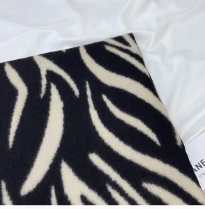 Black and white zebra striped knit scarf detail, soft faux cashmere winter warm wrap.