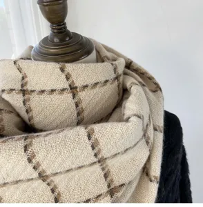 Cozy beige plaid scarf detail shot, thick warm cashmere-feel knit fabric for winter daily wear.