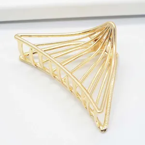 Minimalist zinc alloy geometric triangle hair claw clip in elegant gold finish for daily wear.