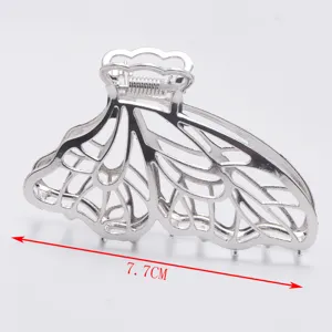 Minimalist silver zinc alloy hair claw clip, large hollow butterfly wing design for women.