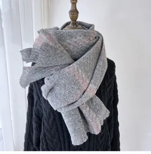 Cozy grey and pink plaid tassel scarf detail, perfect autumn and winter warm thick neck accessory.