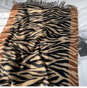 Cozy imitation cashmere winter scarf for women, stylish animal print warm shawl wrap.