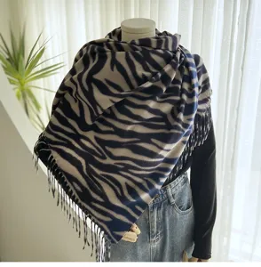 Detailed view of women's autumn winter cashmere feel zebra print tassel cozy warm scarf wrap