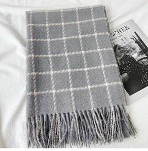 Grey plaid cashmere-feel winter scarf with elegant fringe, thick and warm fashion accessory.