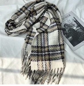Cozy plaid scarf for women, classic checkered pattern with fringe, warm autumn winter accessory.