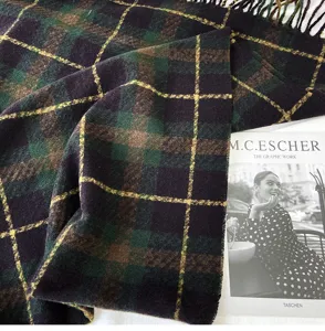 Winter warm plaid scarf close-up detail, thick cozy retro tartan shawl for women