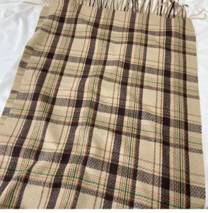 Cozy thick plaid winter scarf with classic check pattern and fringe details for women.