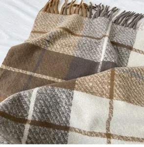 Plaid tassel scarf detail, soft cozy winter warm wrap, brown and grey classic check.