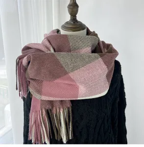Detailed view of the winter warm plaid scarf with soft tassels and cozy knit texture.