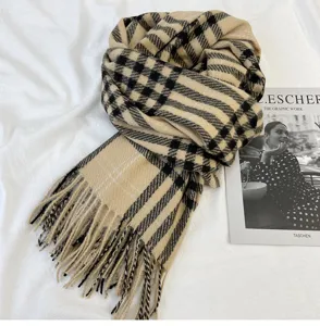 Classic beige and black plaid scarf with fringe detail, cozy winter accessory for daily wear.
