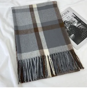Classic grey and brown plaid tassel scarf for women, cozy winter warm apparel accessory.