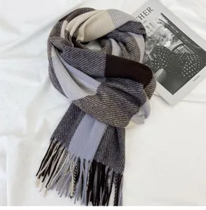Cozy winter plaid scarf for women with fringe detail, thick warm long design for cold weather.