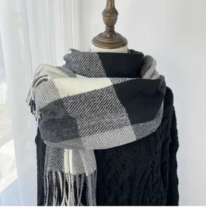Cozy black and white plaid winter scarf with fringe, warm knitted shawl for women and men.