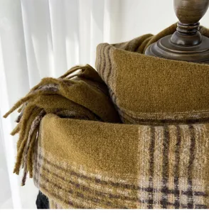Cozy winter plaid scarf with fringe, thick warm long wrap for women, stylish daily accessory.