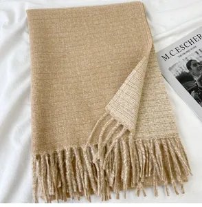 Cozy winter cashmere feel fringe scarf in camel color, elegant warmth and stylish daily wear.