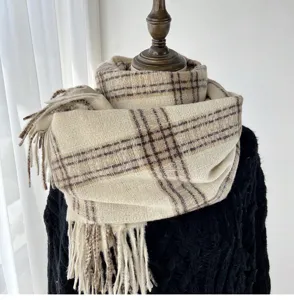 Detailed shot of thick warm plaid tassel long scarf winter soft cozy women fashion accessory