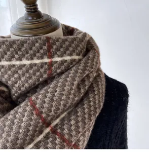 Detailed view of women's warm autumn winter plaid cashmere-feel scarf winter cozy neck wrap