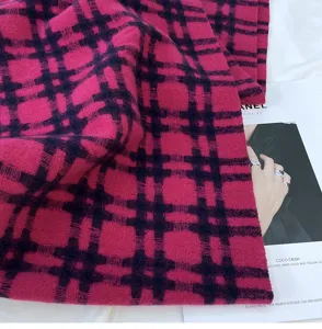 Pink and dark blue plaid scarf detail, soft imitation cashmere fabric for winter warmth.