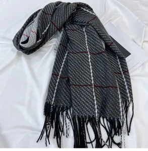 Thick warm winter plaid scarf with fringe, cozy grey checkered pattern for women.