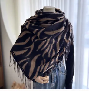 Detailed view of fashionable autumn winter zebra print tassel scarf cozy imitation cashmere shawl.