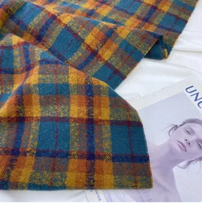Retro plaid winter scarf detailed view, classic blue and yellow cashmere feel warm shawl.