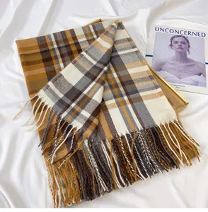 Detailed view of women winter warm plaid tassel imitation cashmere scarf close up display