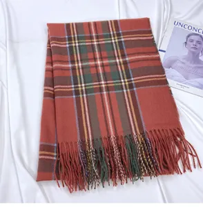 Detailed view of the winter plaid fringe scarf in classic red retro pattern for cozy daily wear.