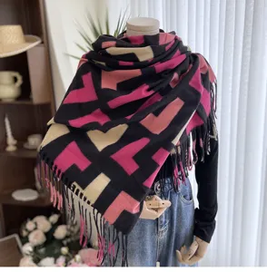 Fashion winter warm tassel scarf featuring a classic geometric pattern and thick cozy design.