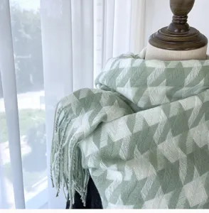 Cozy green large houndstooth scarf with classic tassel fringe, warm autumn winter accessory.