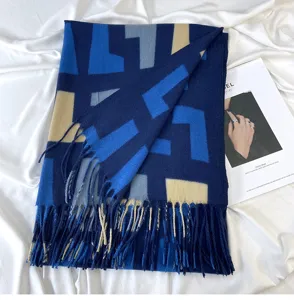 Blue geometric pattern imitation cashmere winter scarf with fringe detail, cozy neck warmer.