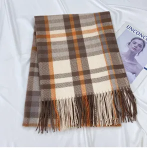 Cozy winter plaid tassel scarf for women, classic brown and orange check cashmere feel design.