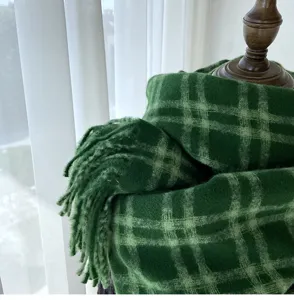 Green plaid imitation cashmere scarf detail shot, cozy winter fringe neckerchief display.