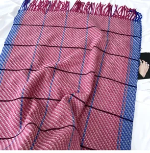 Pink and blue plaid winter scarf detail, soft imitation cashmere shawl with fringe trim.