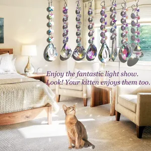 Exquisite crystal suncatcher prism ball pendant for window, creating stunning rainbow light effects.