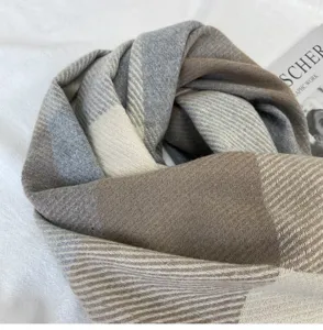 Chic plaid winter scarf with cozy herringbone knit pattern, stylish and warm for daily wear.