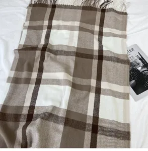 Classic brown and white plaid cashmere feel tassel scarf for women, warm winter fashion.