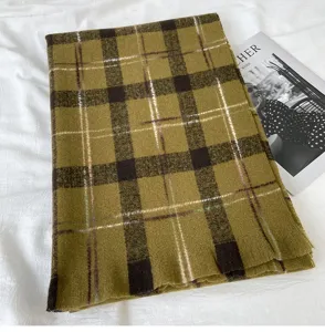 Cozy winter plaid scarf for women, thick warm retro long shawl and scarf detail view.