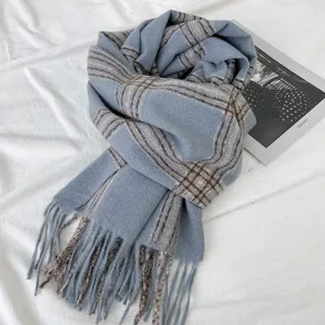 Blue plaid tassel scarf for women, cozy winter warm long knitted plaid scarf main product display.