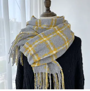 Cozy grey and yellow plaid winter scarf with chic fringe edges, soft warm neck wrap for women.