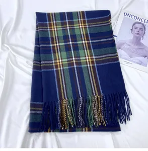 Classic tartan plaid scarf with fringe in navy green and yellow for winter warmth.