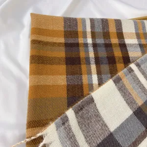 Women winter warm plaid tassel imitation cashmere scarf, stylish cozy soft shawl for daily wear.
