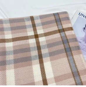 Winter women's cashmere-feel plaid scarf, classic pink grid shawl and winter fashion accessory.