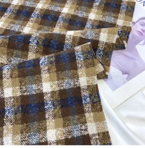 Detailed shot of retro plaid imitation cashmere winter scarf and cozy shawl for women.