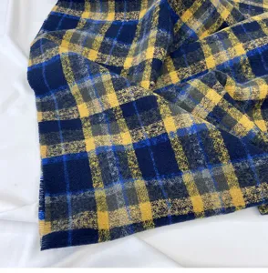 Blue yellow grey plaid scarf detail texture closeup winter warm soft fabric soft cozy fashion
