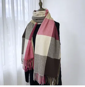 Detailed view of the winter plaid imitation cashmere scarf with soft tassels and warm design.