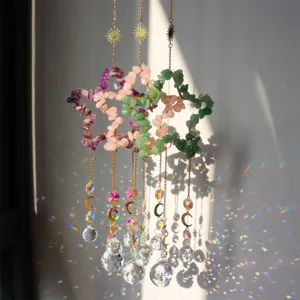 Crystal suncatcher star hanging pendant with healing gemstone chips and rainbow prism balls.