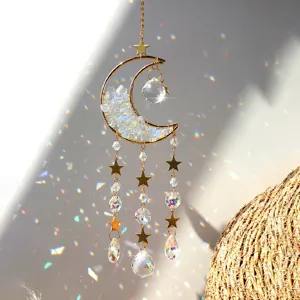 Crystal suncatcher hanging ornament with crescent moon stars and crushed stones for home decor.