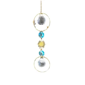 Crystal suncatcher hanging ornament with golden rings, sun charm, and clear crystal balls.
