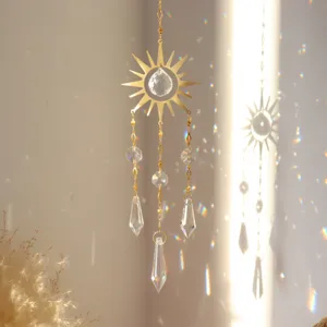 Crystal suncatcher hanging pendant with gold sun metal frame and rainbow prism decor