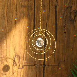 3D rotating crystal suncatcher with metal rings, rainbow maker window hanging decor.